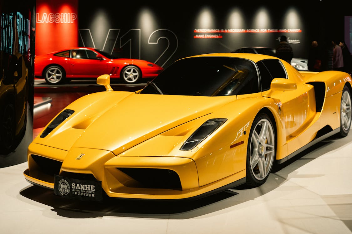 Yellow luxury sports car in a premium showroom